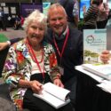 Virginia Bell and David Troxel signing their book